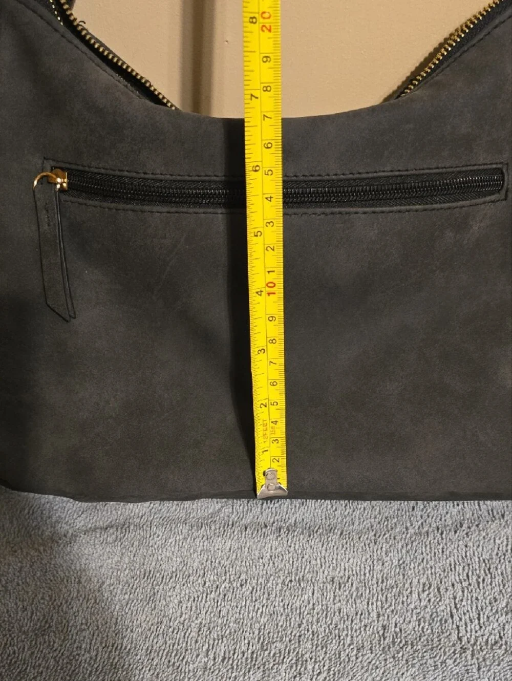 Rosetti Black Suede Drawstring Crossbody Bag with Gold Hardware
